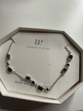 Black onyx on rhodium